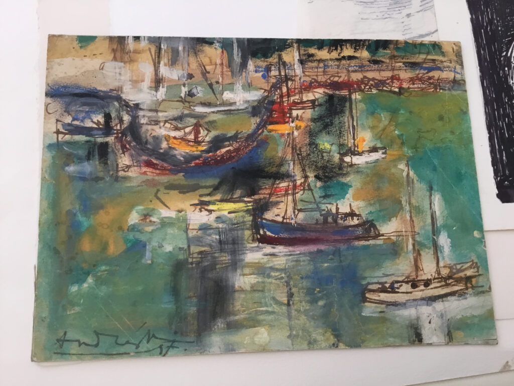 Rio by Constantine Andreou: boats with dark hulls and tall masts on green and blue water.